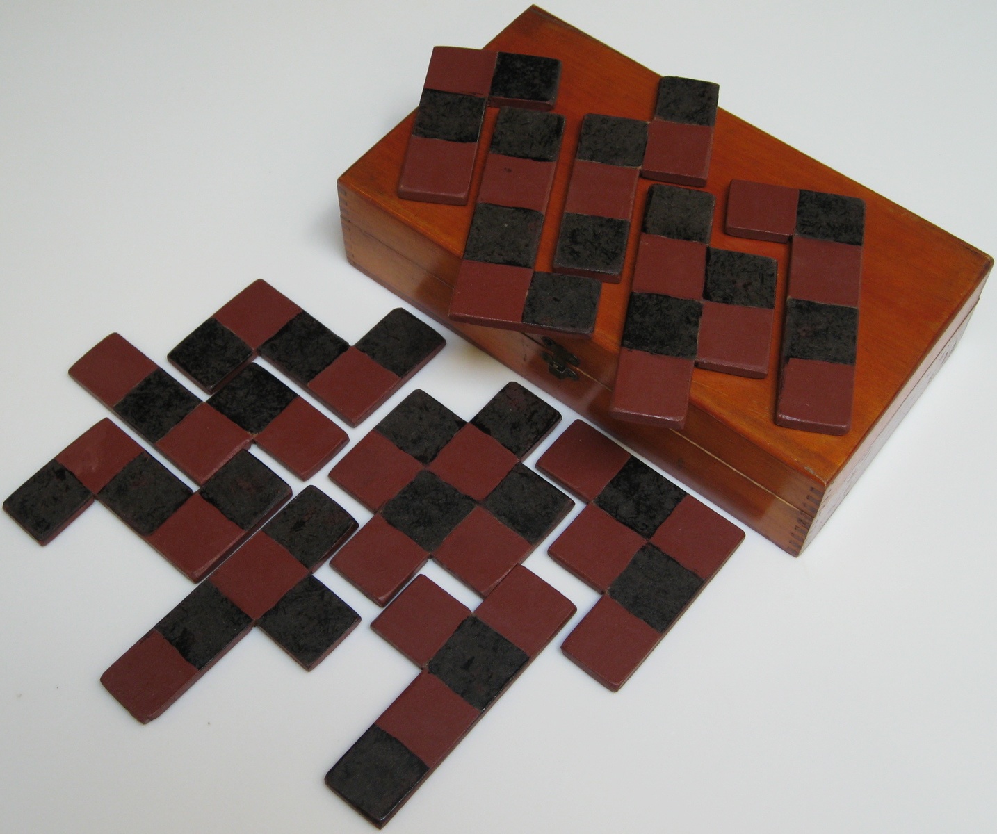 "Checkerboard (a.k.a. All Square Novelty Puzzle, Check-A-Board